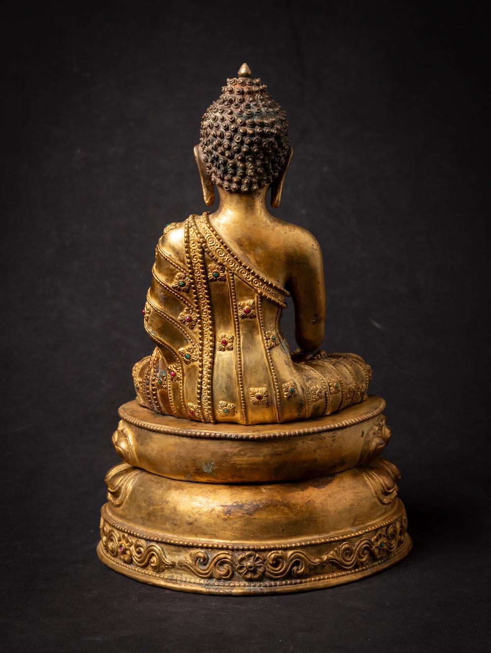 Mid-20th century old bronze Nepali Buddha statue i20.5nlaid with real gem stones In Good Condition In DEVENTER, NL
