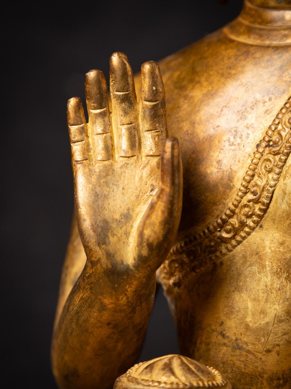 Mid-20th century old bronze Nepali Buddha statue in Abhaya Mudra 11