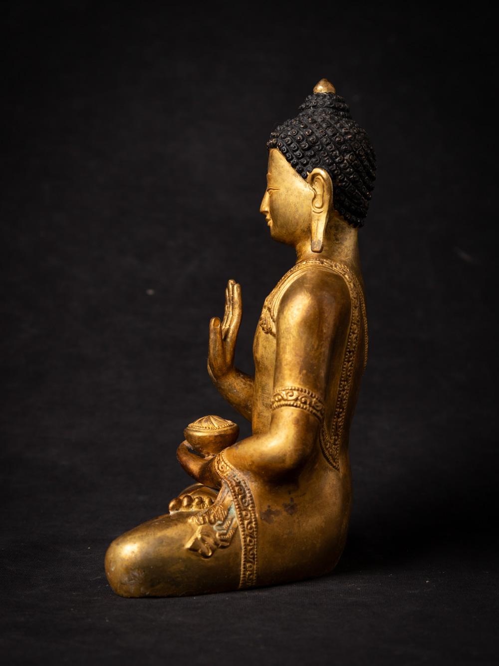 Nepalese Mid-20th century old bronze Nepali Buddha statue in Abhaya Mudra
