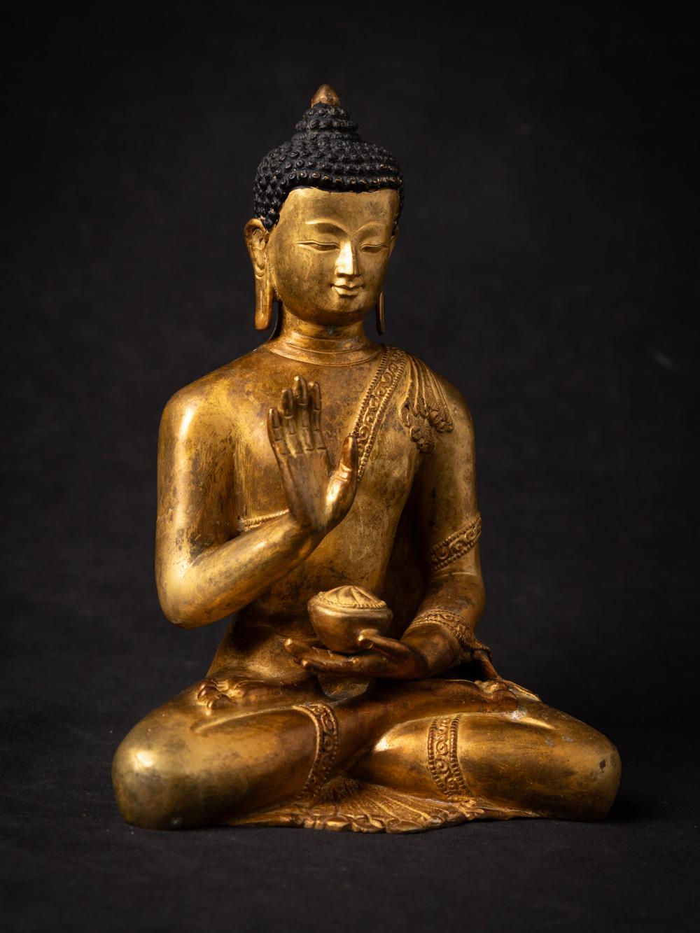 Mid-20th century old bronze Nepali Buddha statue in Abhaya Mudra 1
