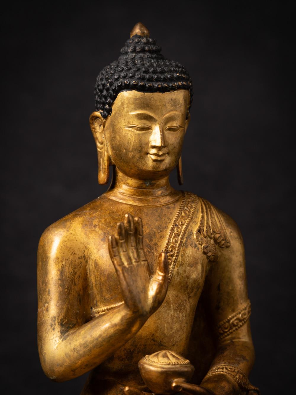 Mid-20th century old bronze Nepali Buddha statue in Abhaya Mudra 2