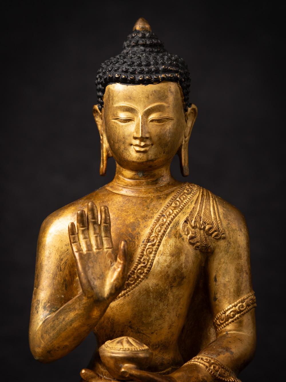 Mid-20th century old bronze Nepali Buddha statue in Abhaya Mudra 3