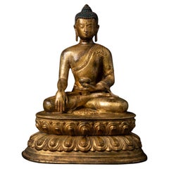 Mid 20th century Old bronze Nepali Buddha statue in Bhumisparsha Mudra