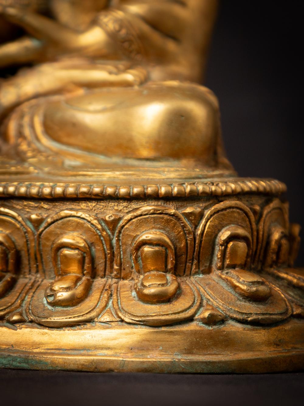 Mid-20th century old bronze Nepali Buddha statue in Varada Mudra 11