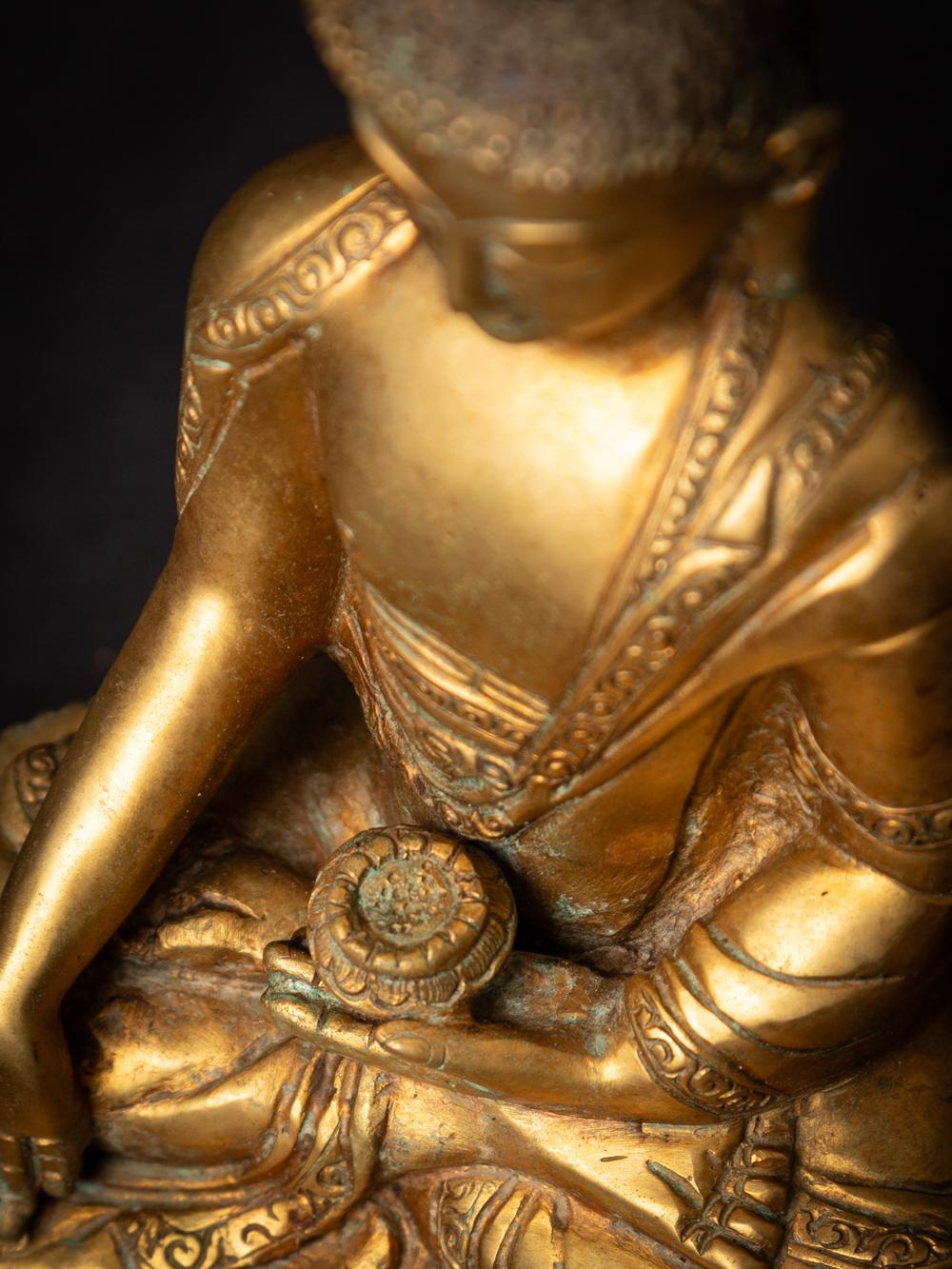 Mid-20th century old bronze Nepali Buddha statue in Varada Mudra 13