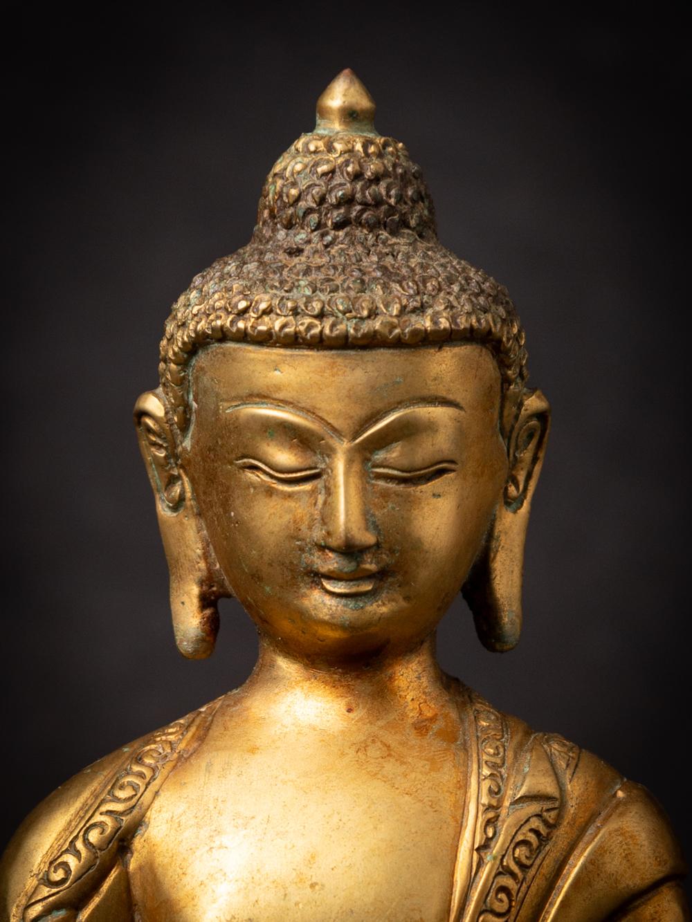 Bronze Mid-20th century old bronze Nepali Buddha statue in Varada Mudra