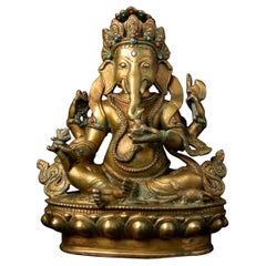 Mid-20th century old bronze Nepali Ganesha statue with gold fire gilded