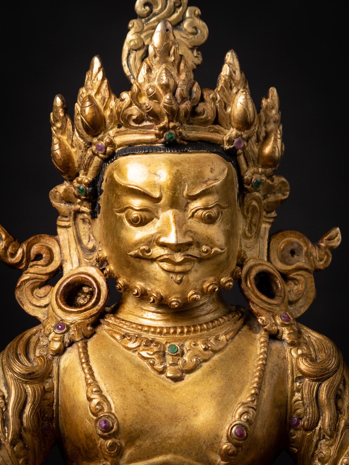 Mid-20th century Old bronze Nepali Kuber statue fire gilded with 24 krt. gold In Good Condition In DEVENTER, NL