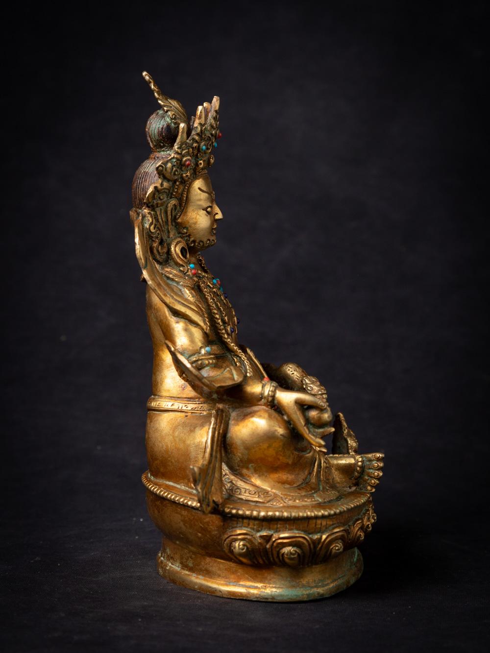 20th Century Mid-20th century old bronze Nepali Kuber statue fire gilded with 24 krt. gold For Sale