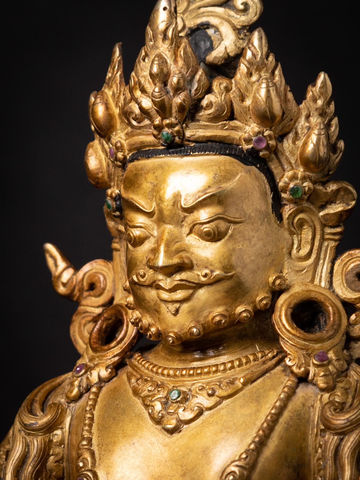 Bronze Mid-20th century Old bronze Nepali Kuber statue fire gilded with 24 krt. gold