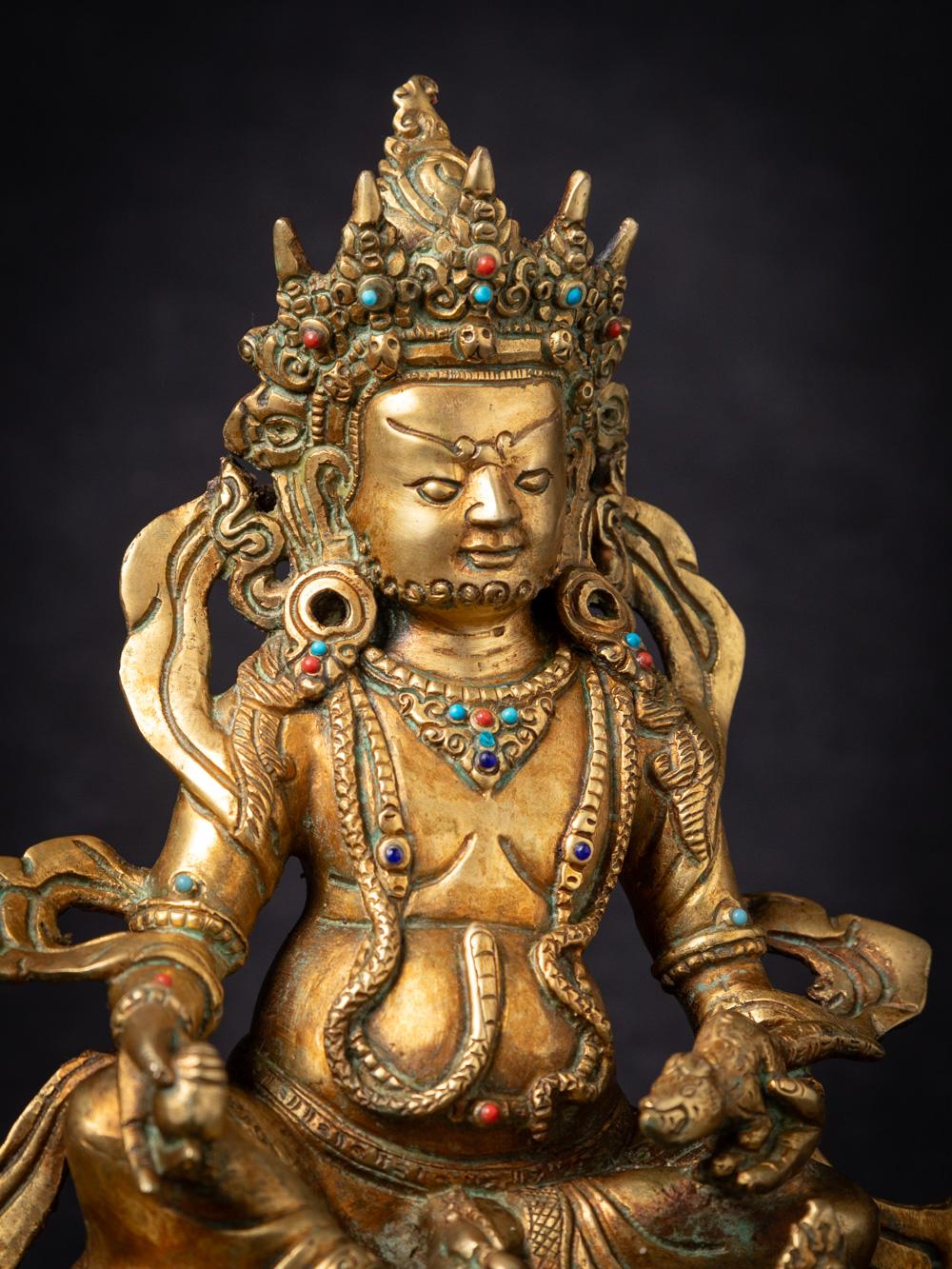 Mid-20th century old bronze Nepali Kuber statue fire gilded with 24 krt. gold For Sale 1