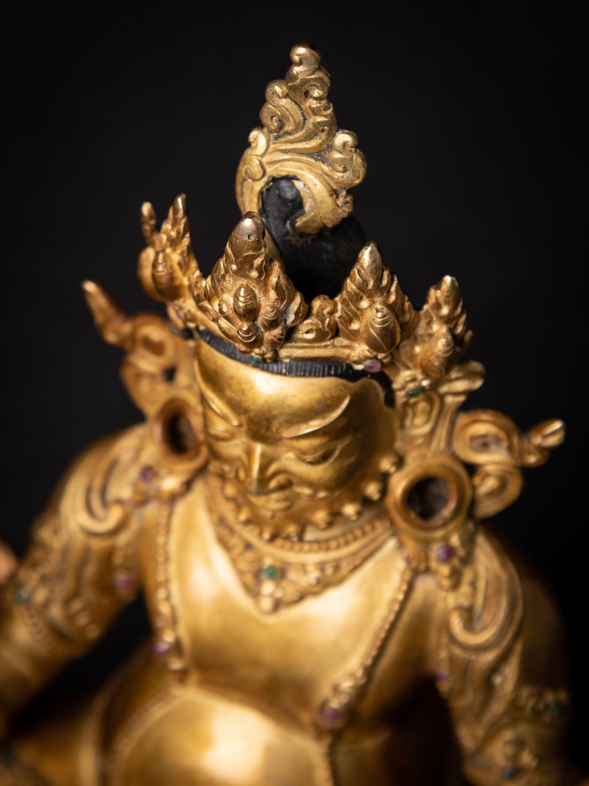 Mid-20th century Old bronze Nepali Kuber statue fire gilded with 24 krt. gold 2