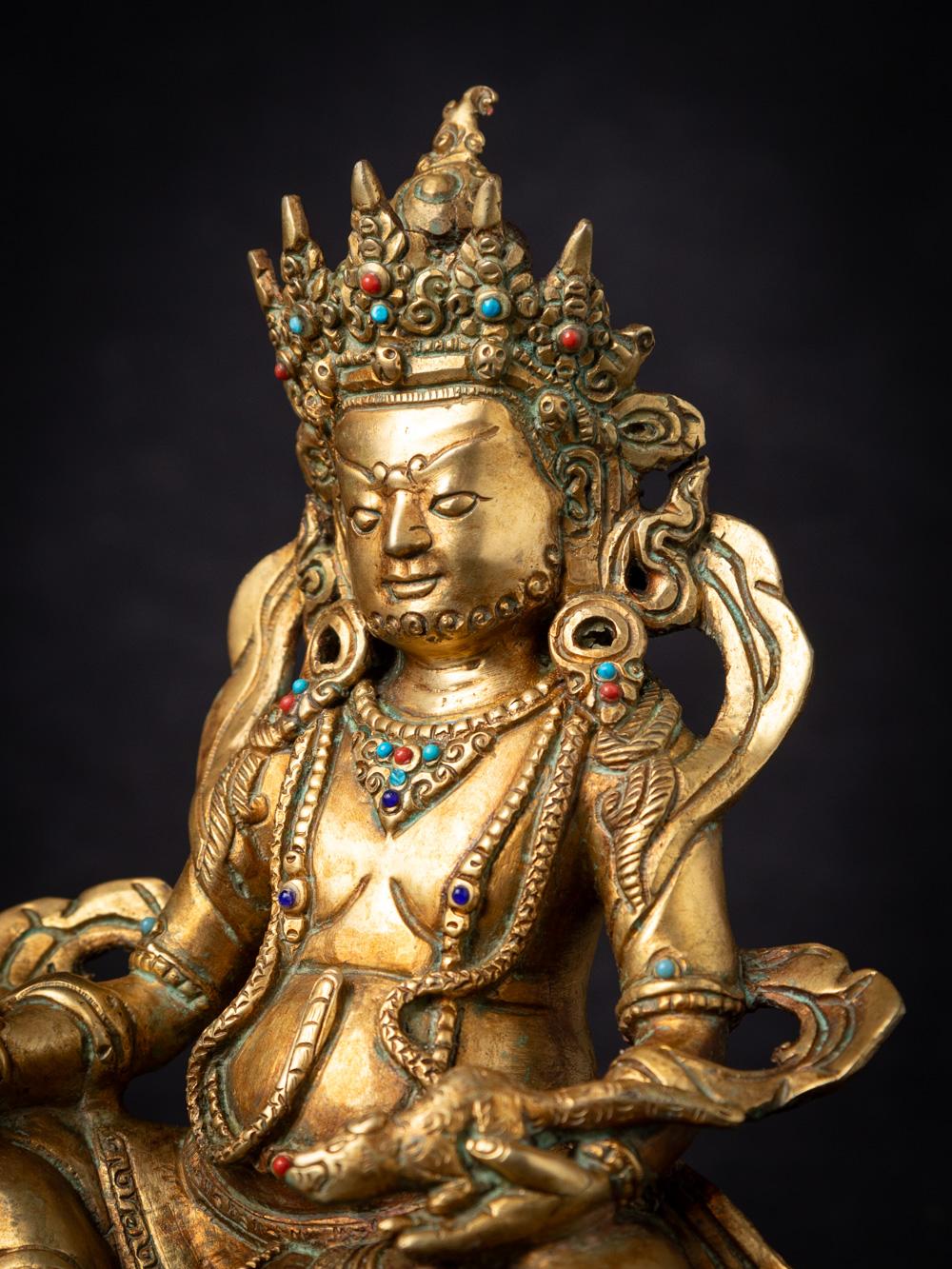 Mid-20th century old bronze Nepali Kuber statue fire gilded with 24 krt. gold For Sale 3