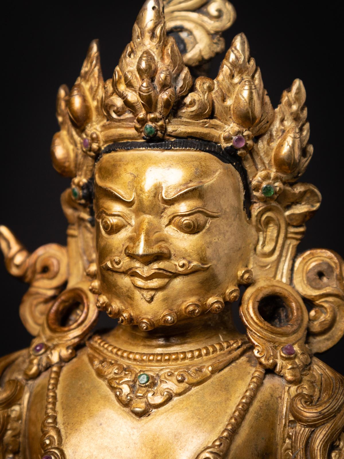 Mid-20th century Old bronze Nepali Kuber statue fire gilded with 24 krt. gold 3