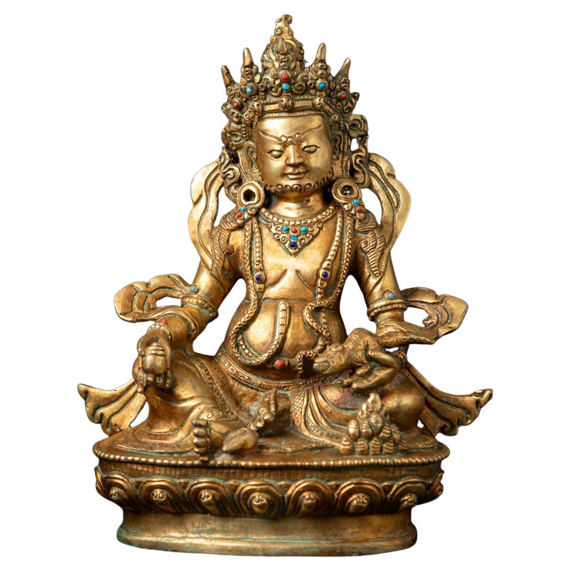 Mid-20th century old bronze Nepali Kuber statue fire gilded with 24 krt. gold For Sale