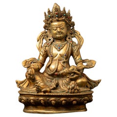 Mid-20th century Old bronze Nepali Kuber statue fire gilded with 24 krt. gold