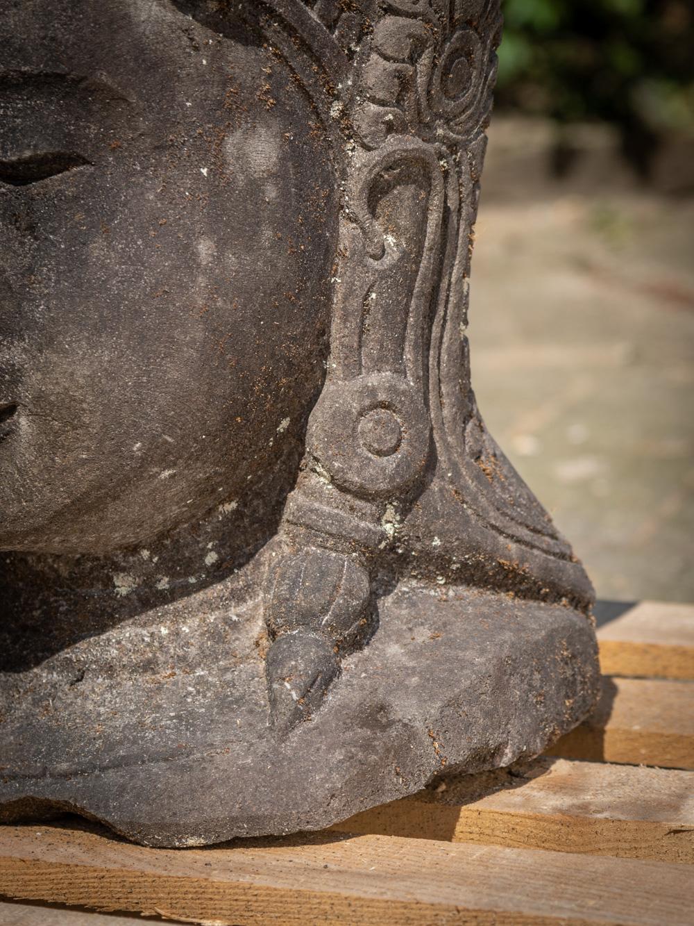 The old lavastone head of Shiva is a captivating and monumental artifact sculpted from the enduring lavastone material. Standing at an impressive height of 66 cm, with a width of 36 cm and a depth of 31 cm, this head exudes a commanding presence.
