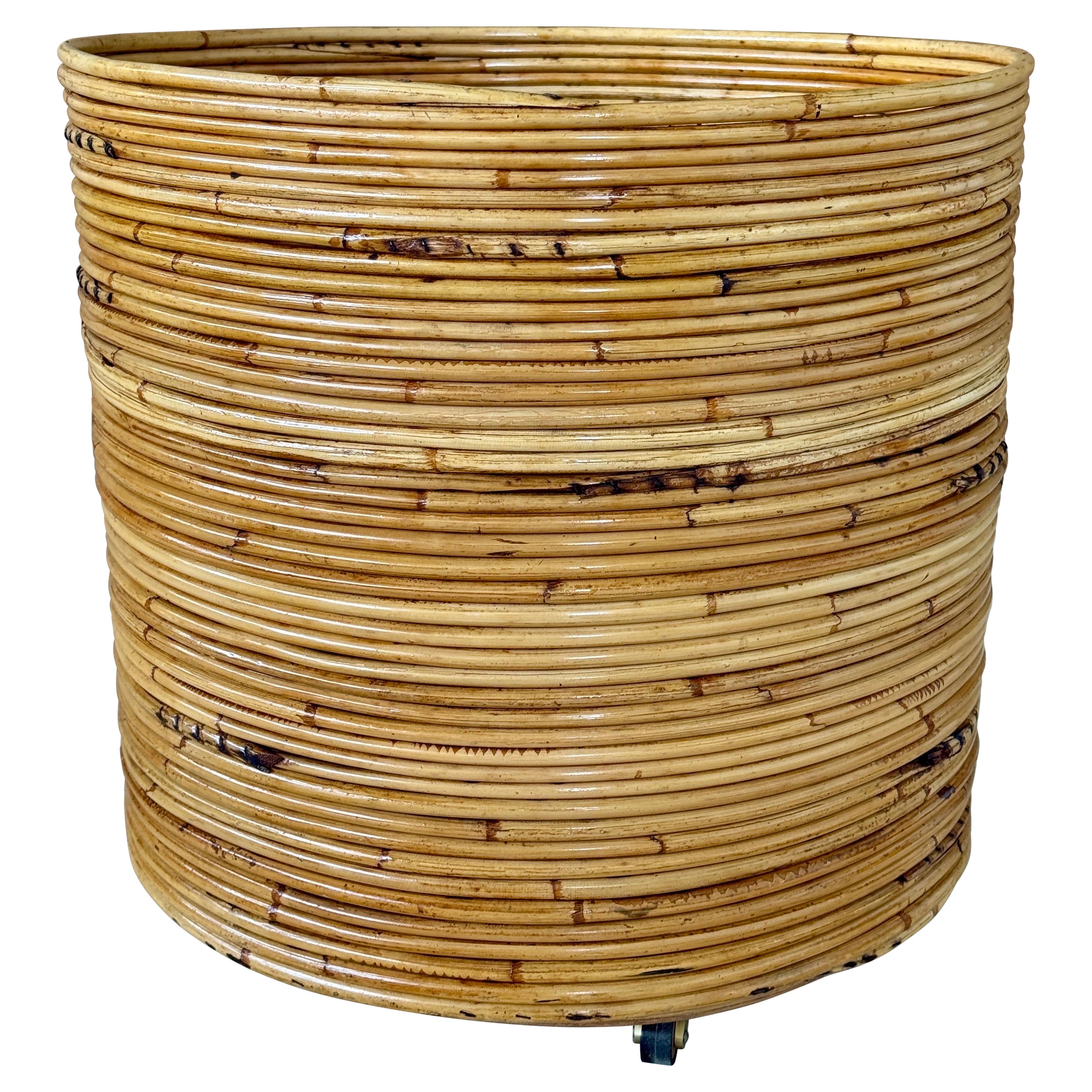 Mid-20th Century Organic Modern Pencil Rattan Rolling Planter or Wastebasket