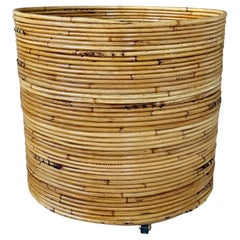 Mid-20th Century Organic Modern Pencil Rattan Rolling Planter or Wastebasket