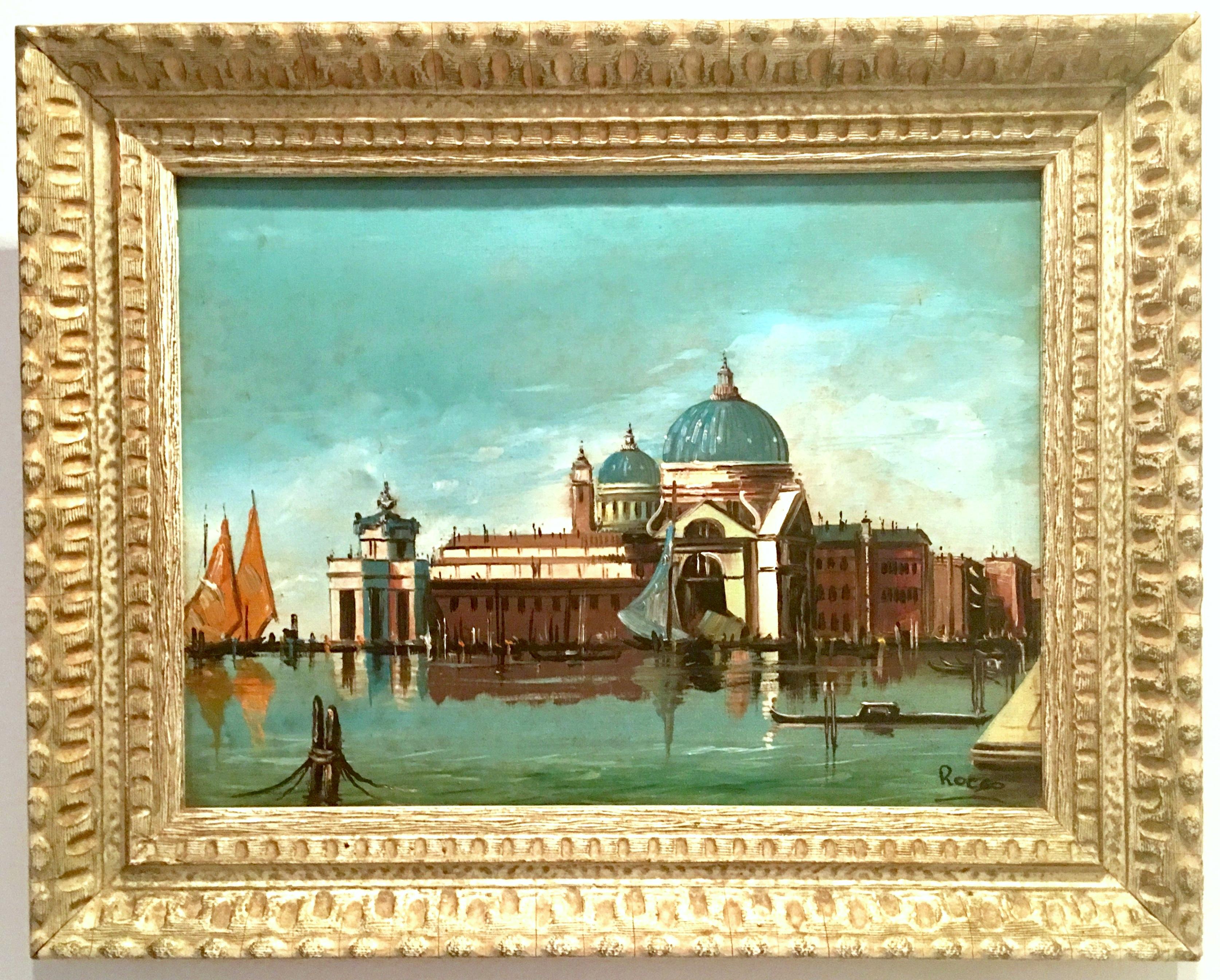 Mid-20th Century original oil on canvas painting by Italian artist, Rocco. This lovely original oil on canvas painting features an Venetian harbor scene. Framed in a hand carved natural wood gold gilt wash frame, Artist-signed lower right, Rocco.