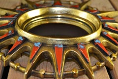 Mid-20th Century Oval Gilded Sunburst Mirror with Blue and Red Ceramic Details