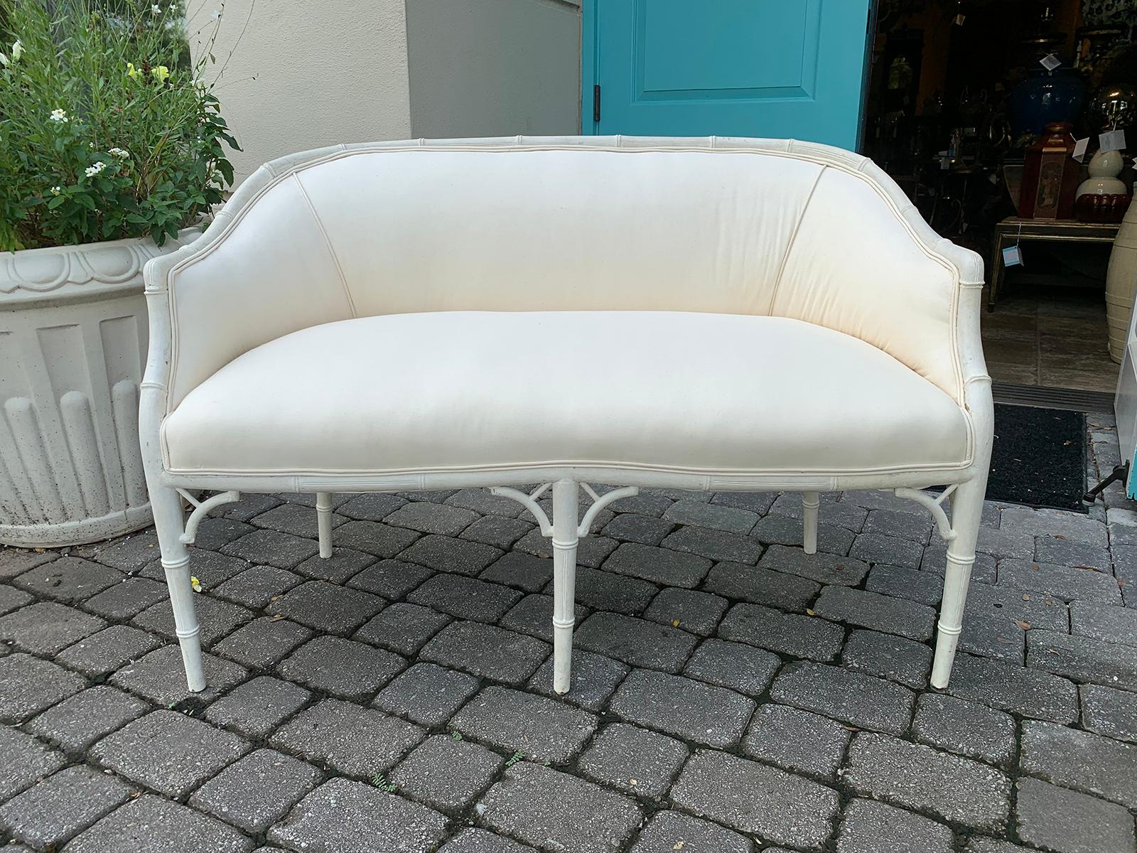 Mid-20th century painted bamboo settee with custom finish
Upholstered in muslin
Measures: Seat: 19