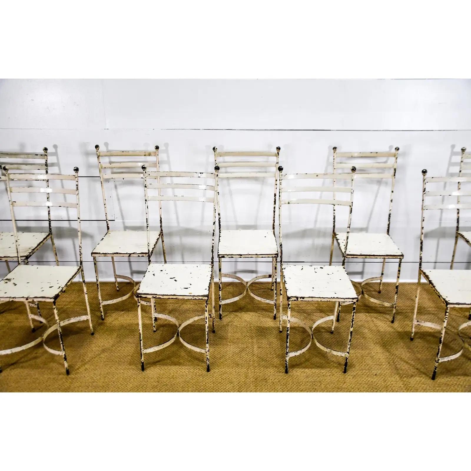 Rare set of 12pc. Lot of Painted Metal Bistro Chairs 

They have a weathered patina that gives them a rich, rustic vibe.  Great for inside or outside use. Some rust and paint wear, as pictured Excellent set that work with French, Shabby Chic, and