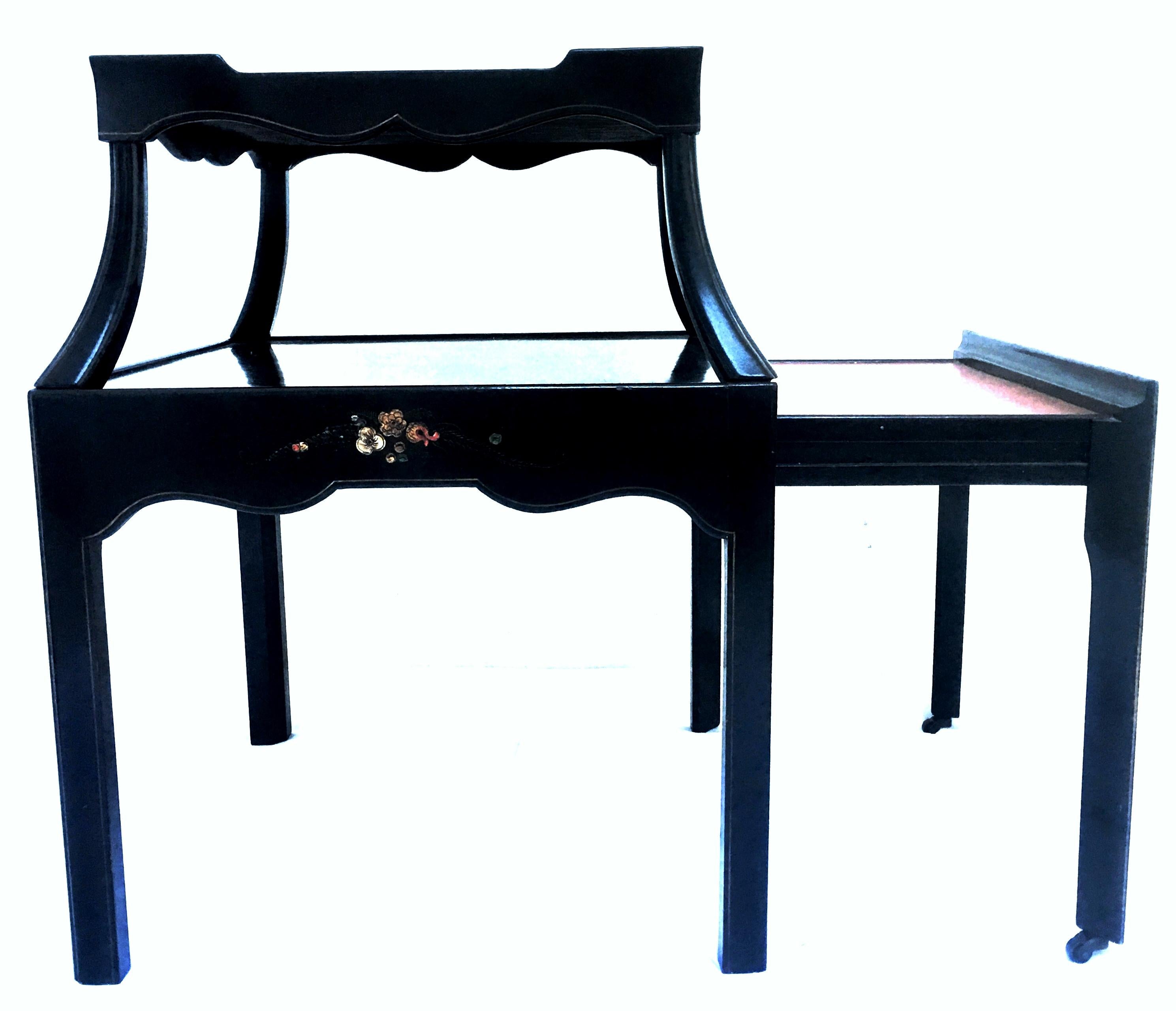 American Mid-20th Century Pair of Ebonized Wood Hand Painted Rolling Two-Tier Side Tables For Sale