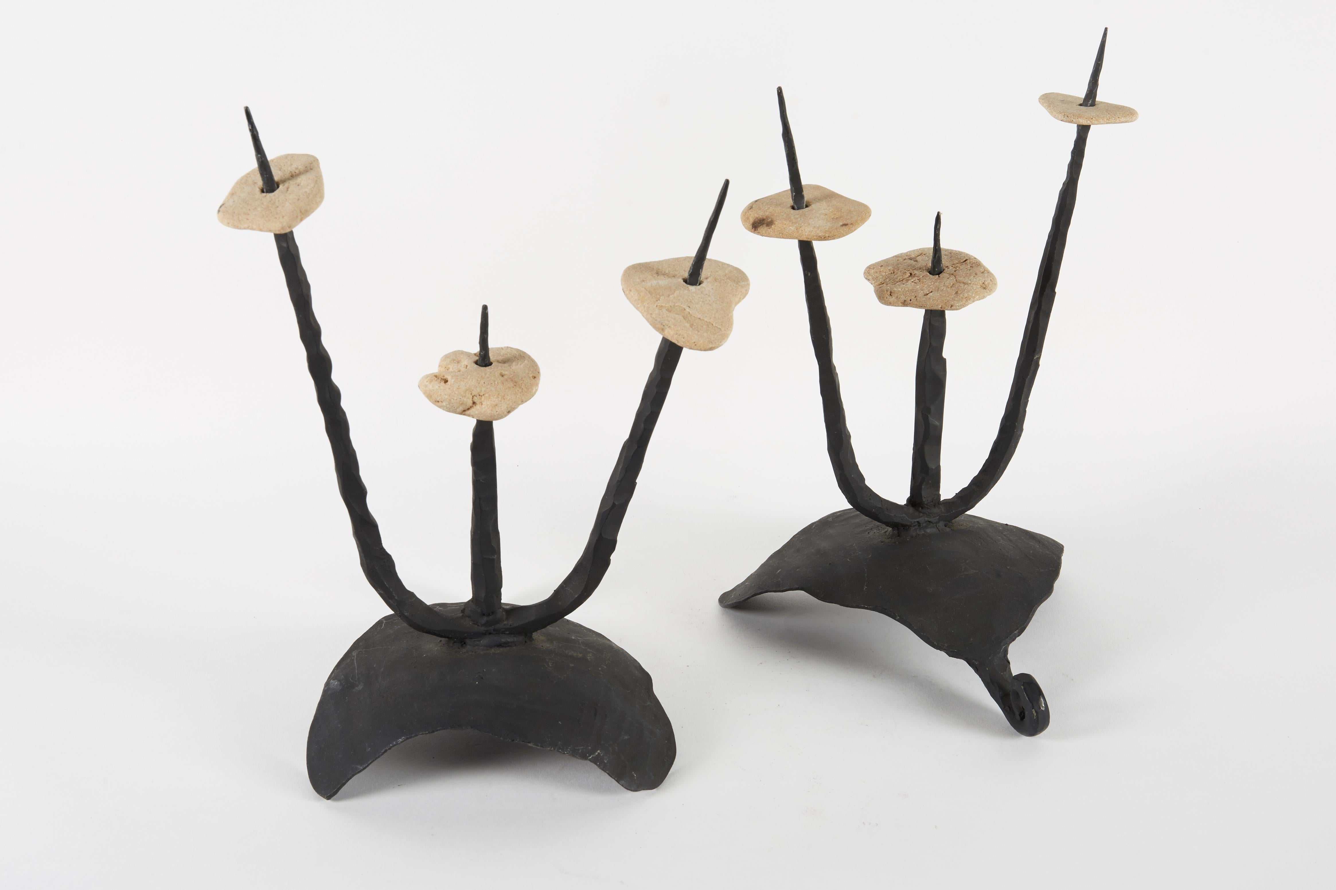 These two pieces by Israeli artist David Palombo are in his signature Brutalist style and use the two materials he is best known for iron and natural stone. Fully functional as candle holders, they also have great presence as free standing