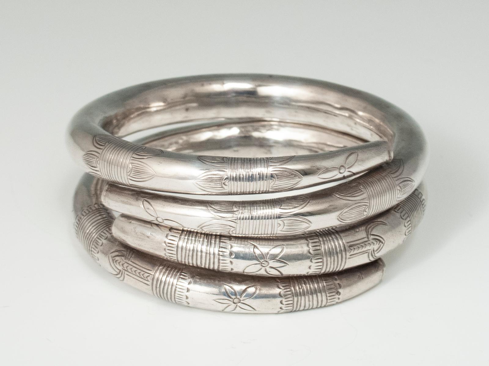 Mid-20th Century Pair of Hollow Silver Incised Bracelets, China