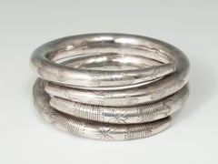 Used Mid-20th Century Pair of Hollow Silver Incised Bracelets, China