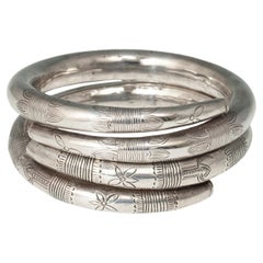 Mid-20th Century Pair of Hollow Silver Incised Bracelets, China