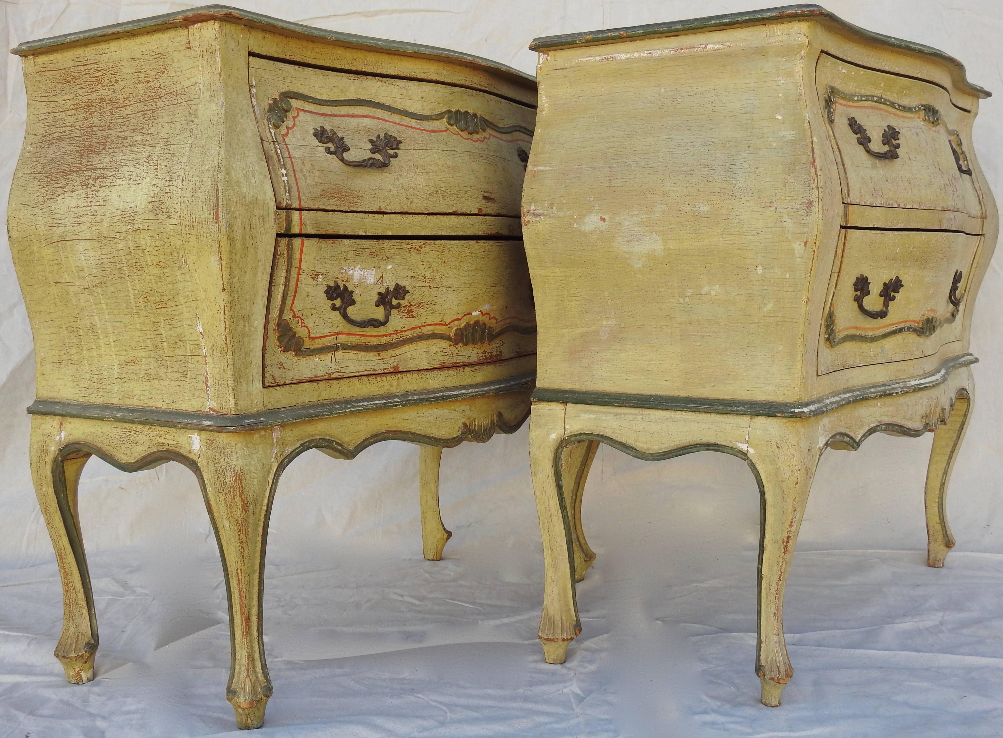 The graceful carved sides will make these hand-painted Bombay chests stand out in your abode. They have been finished in a soft gold with accents of green and orange. The two drawers are completed with bronze pulls. The interior of the drawers are