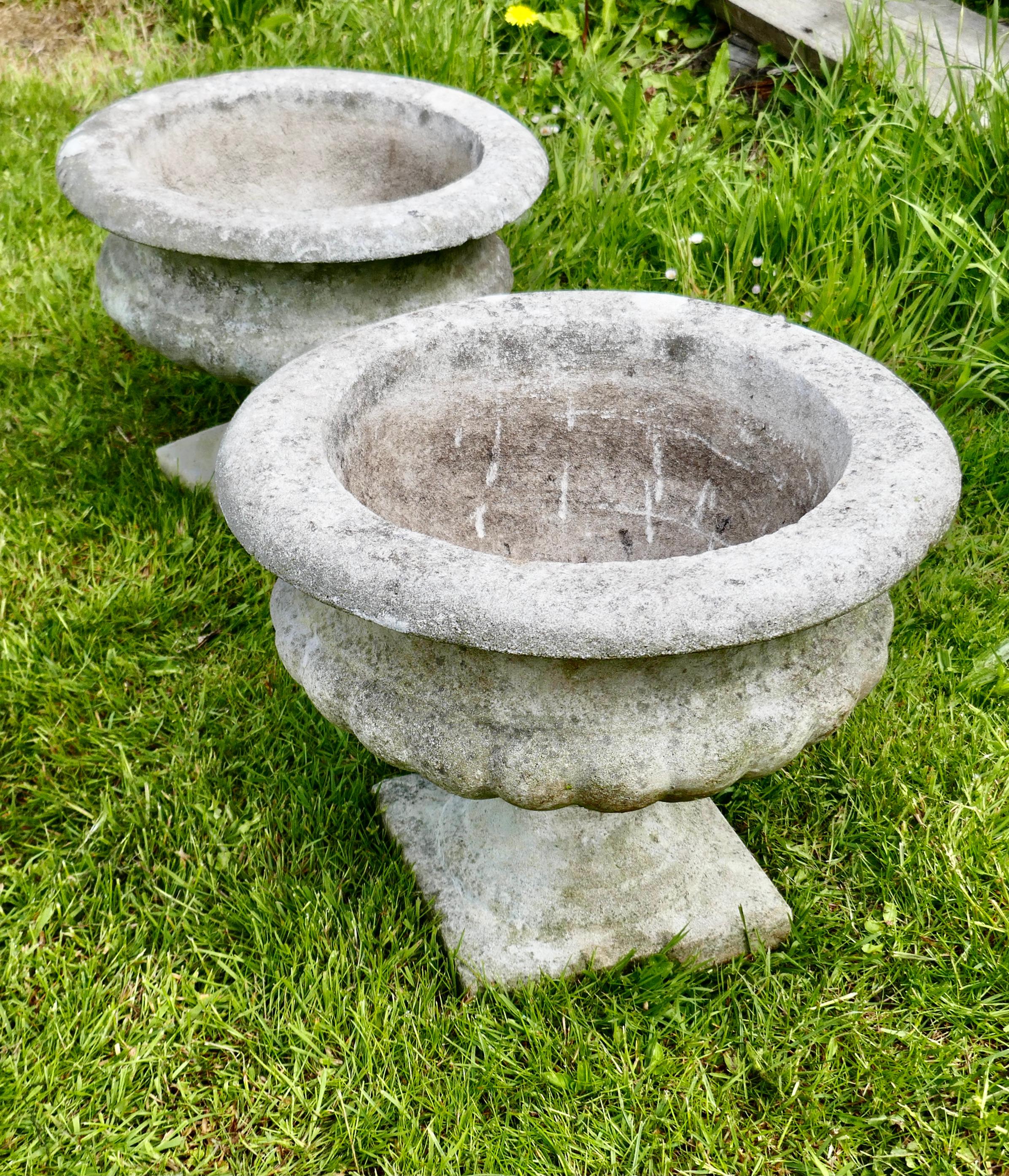weathered cast stone planters
