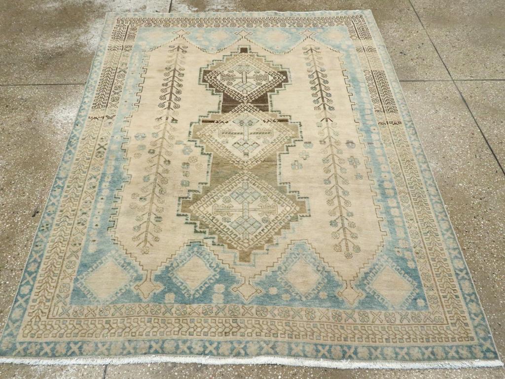A vintage Persian Afshar accent rug handmade during the Mid-20th century.

Measures: 4' 9