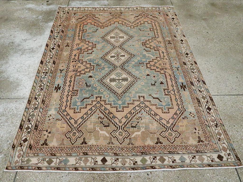 A vintage Persian Afshar accent rug handmade during the Mid-20th century.

Measures: 5' 1