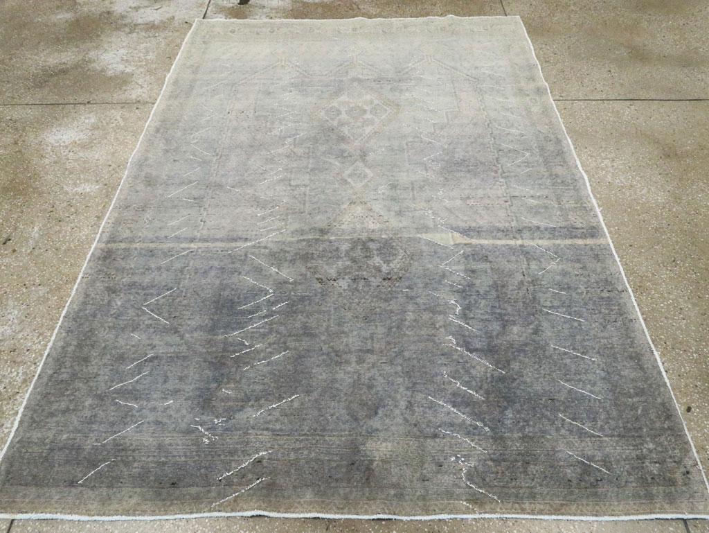 A vintage Persian Afshar accent rug handmade during the Mid-20th century.

Measures: 5' 2