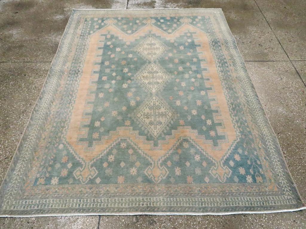 A vintage Persian Afshar accent rug handmade during the Mid-20th century.

Measures: 5' 3