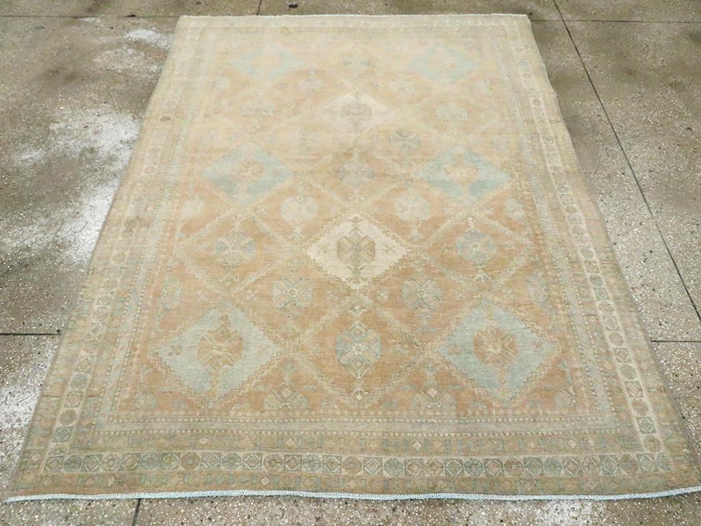 A vintage Persian Afshar accent rug handmade during the Mid-20th century.

Measures: 5' 3