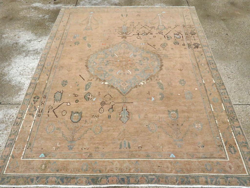 Off-white cotton details pop up almost randomly in partial border lines, in the ogival medallion and in the straight stems of tall tulip flowers at one end. The rug has a general straw tone with a pale blue medallion with irregular serrated edge.