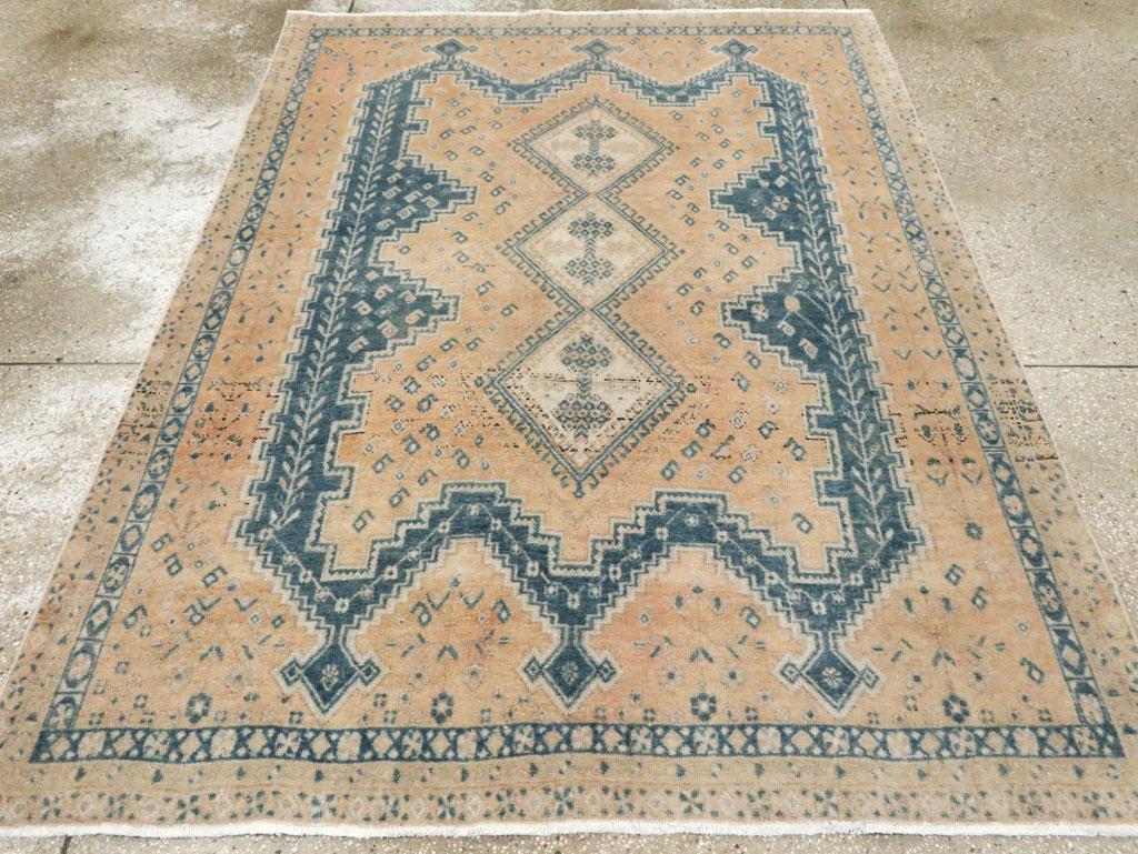 A vintage Persian Afshar accent rug handmade during the Mid-20th century.

Measures: 5' 6