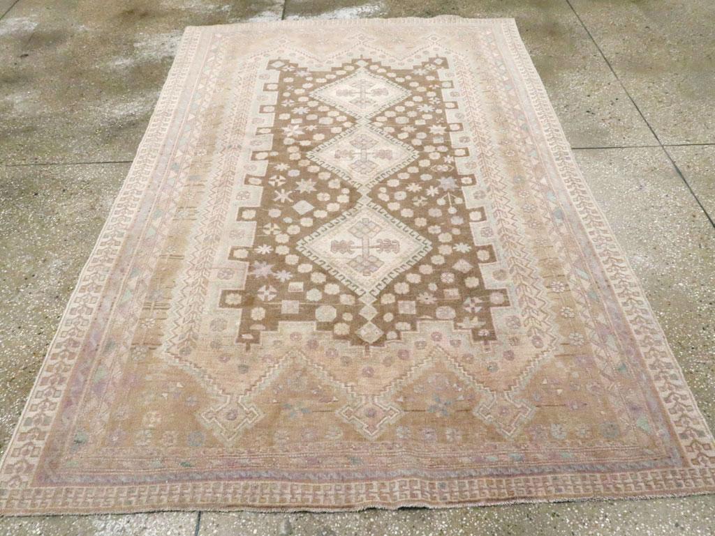 A vintage Persian Afshar accent rug handmade during the Mid-20th century.

Measures: 5' 3
