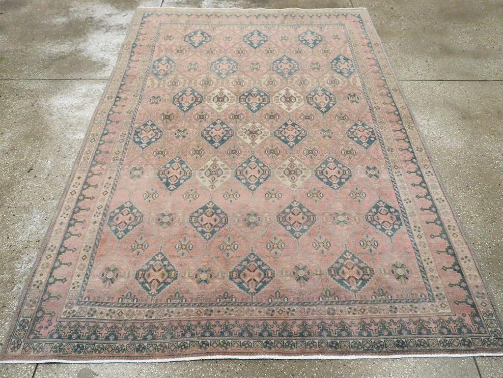 Alfombra de acento persa Afshar vintage hecha a mano a mediados del siglo XX.

Medidas: 5' 8