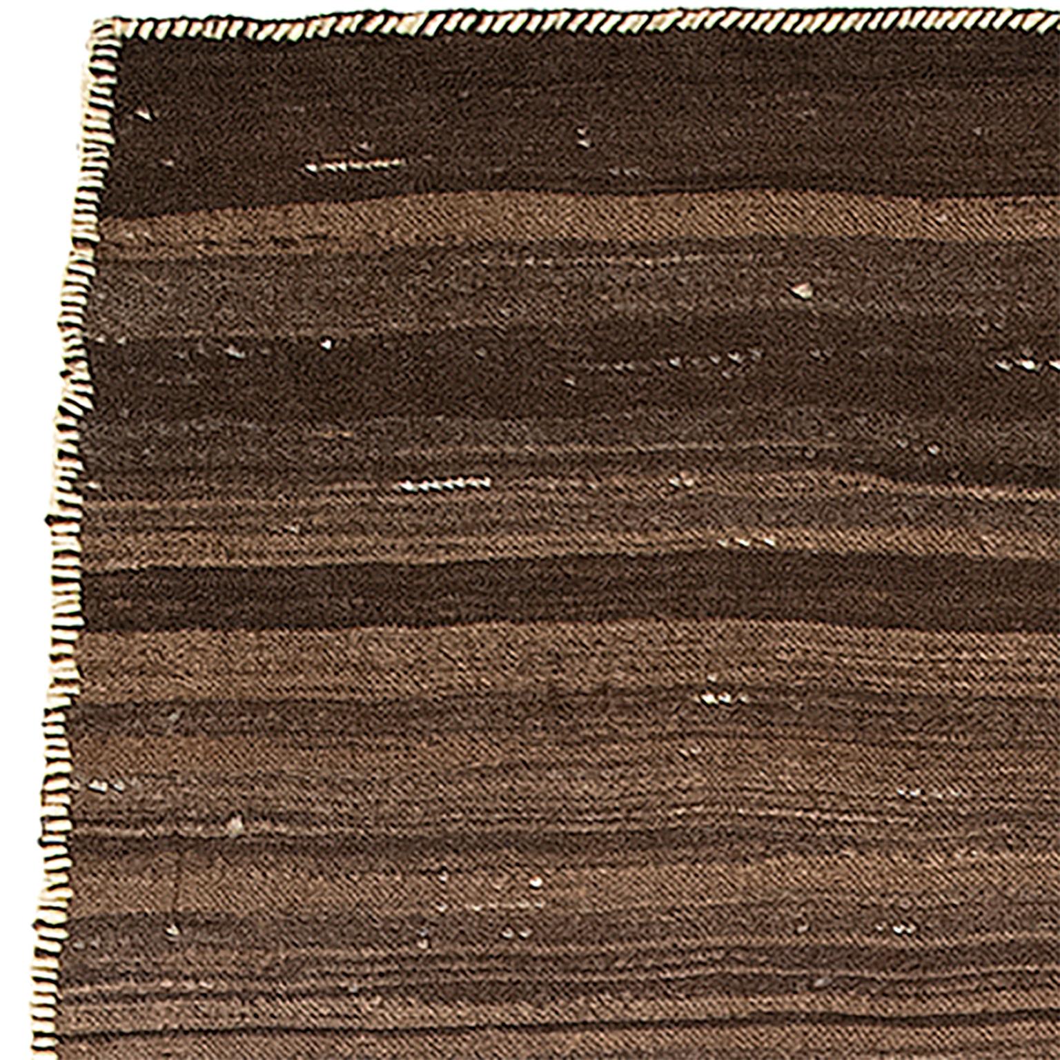 Vintage Kilim rug
Persia circa 1940
Dark Brown
Flatweave
Center seam


Measures: 17
