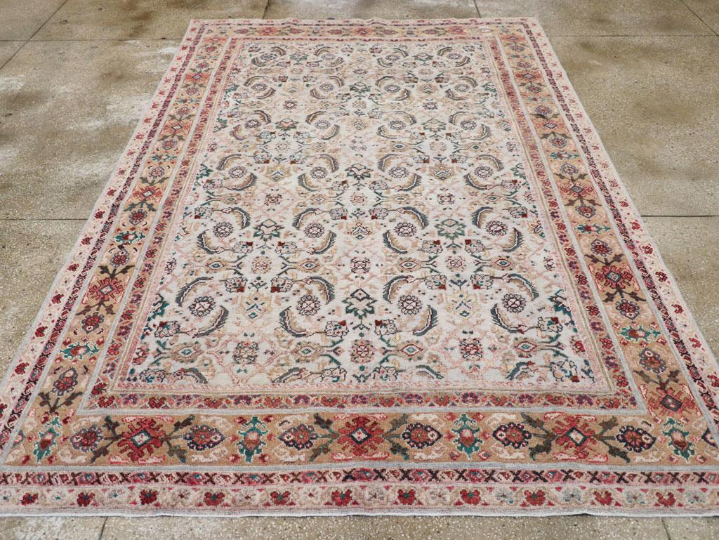 A vintage Persian Mahal accent carpet handmade during the Mid-20th century.

Measures: 7' 5