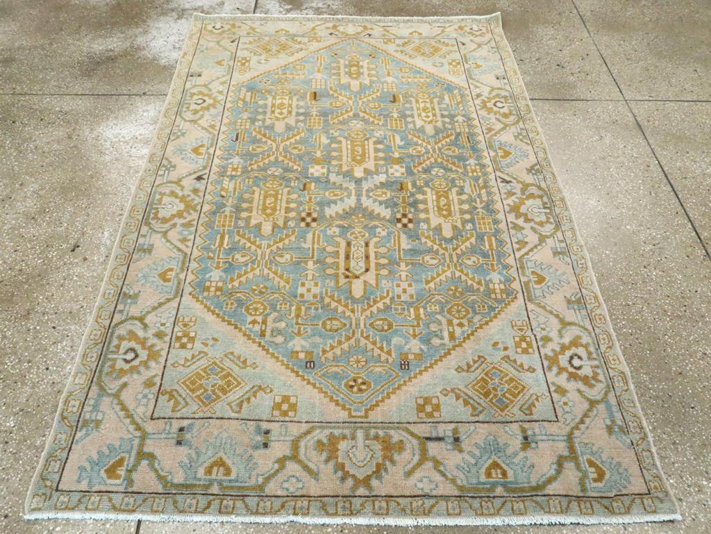 A vintage Persian Malayer accent rug handmade during the Mid-20th century.

Measures: 4' 4