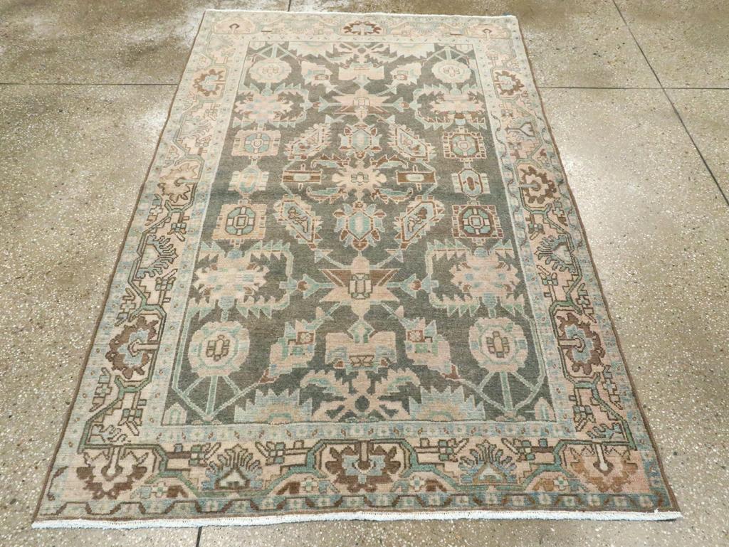 A vintage Persian Malayer accent rug handmade during the Mid-20th century.

Measures: 4' 4