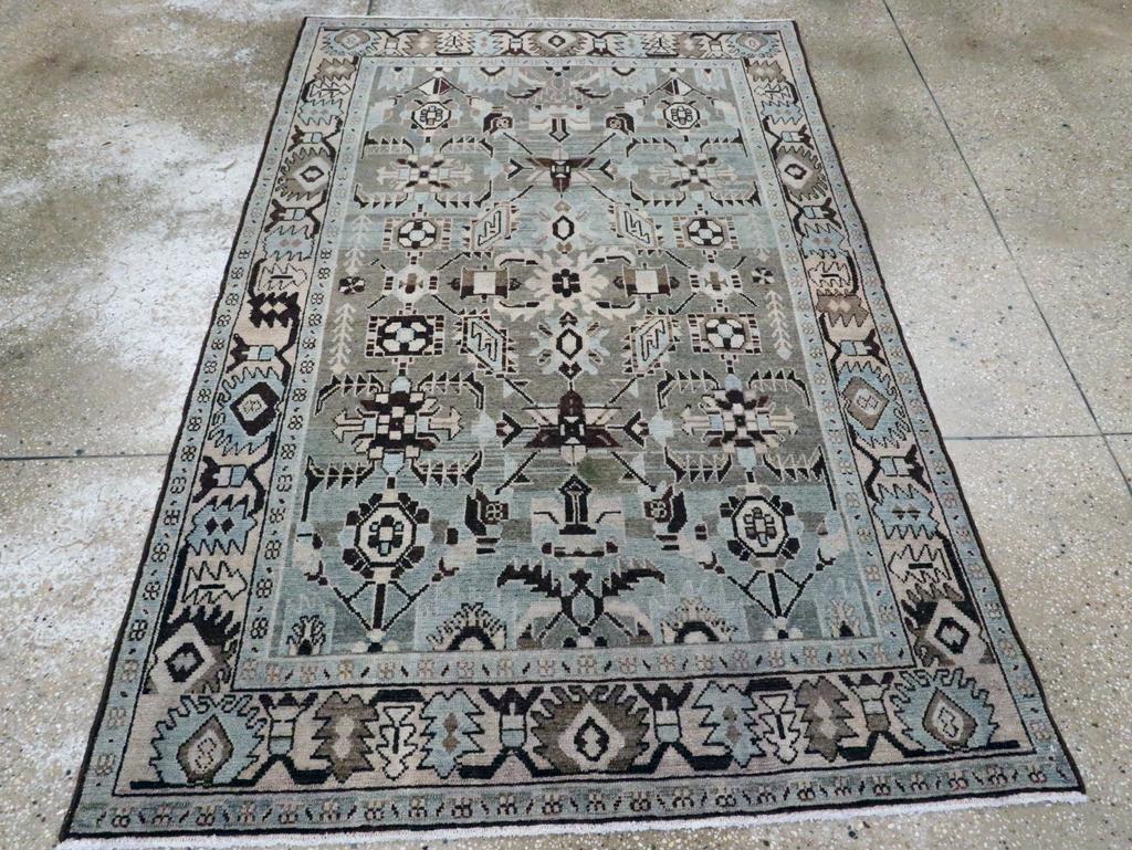 A vintage Persian Malayer accent rug handmade during the Mid-20th century.

Measures: 4' 4
