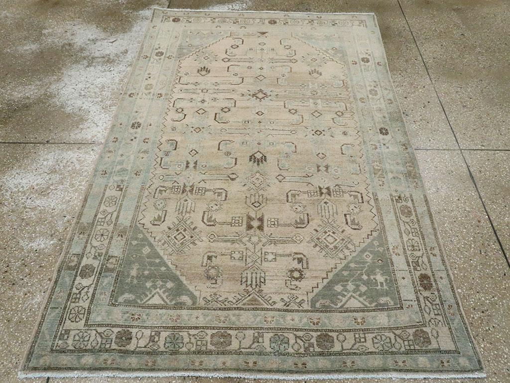 A vintage Persian Malayer accent rug handmade during the Mid-20th century.

Measures: 4' 4