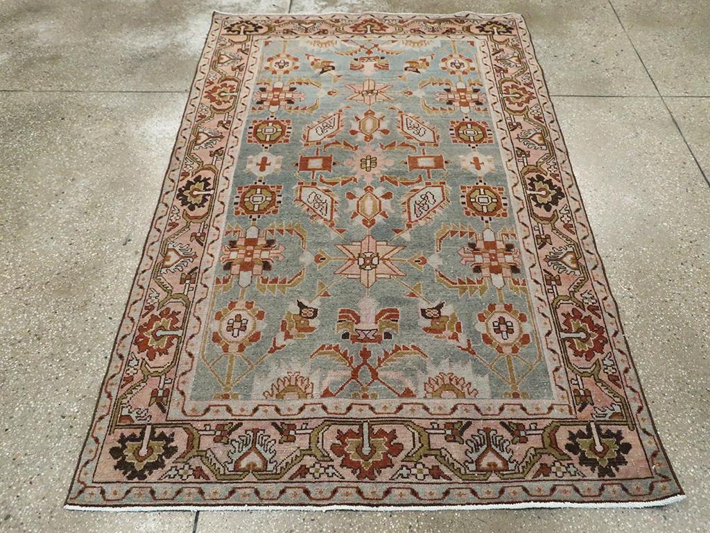 A vintage Persian Malayer accent rug handmade during the Mid-20th century.

Measures: 4' 4